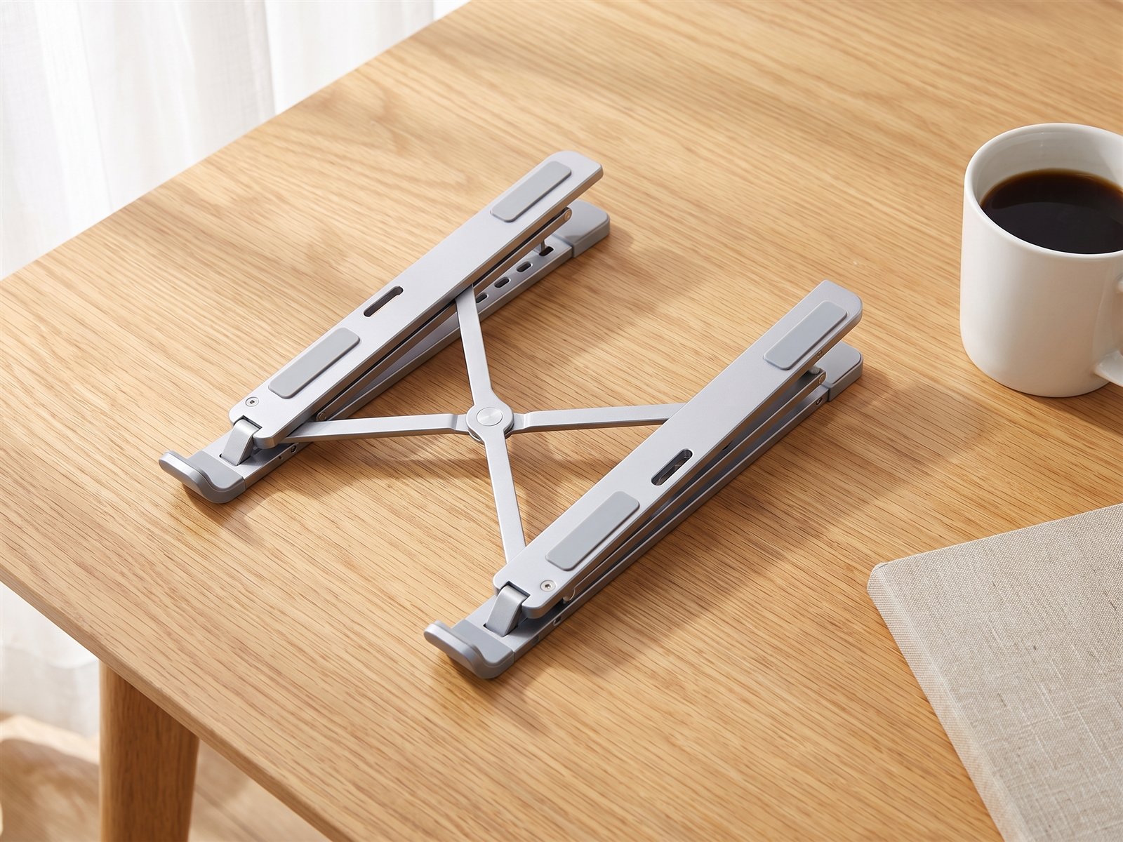Laptop stand — On the desk · from above