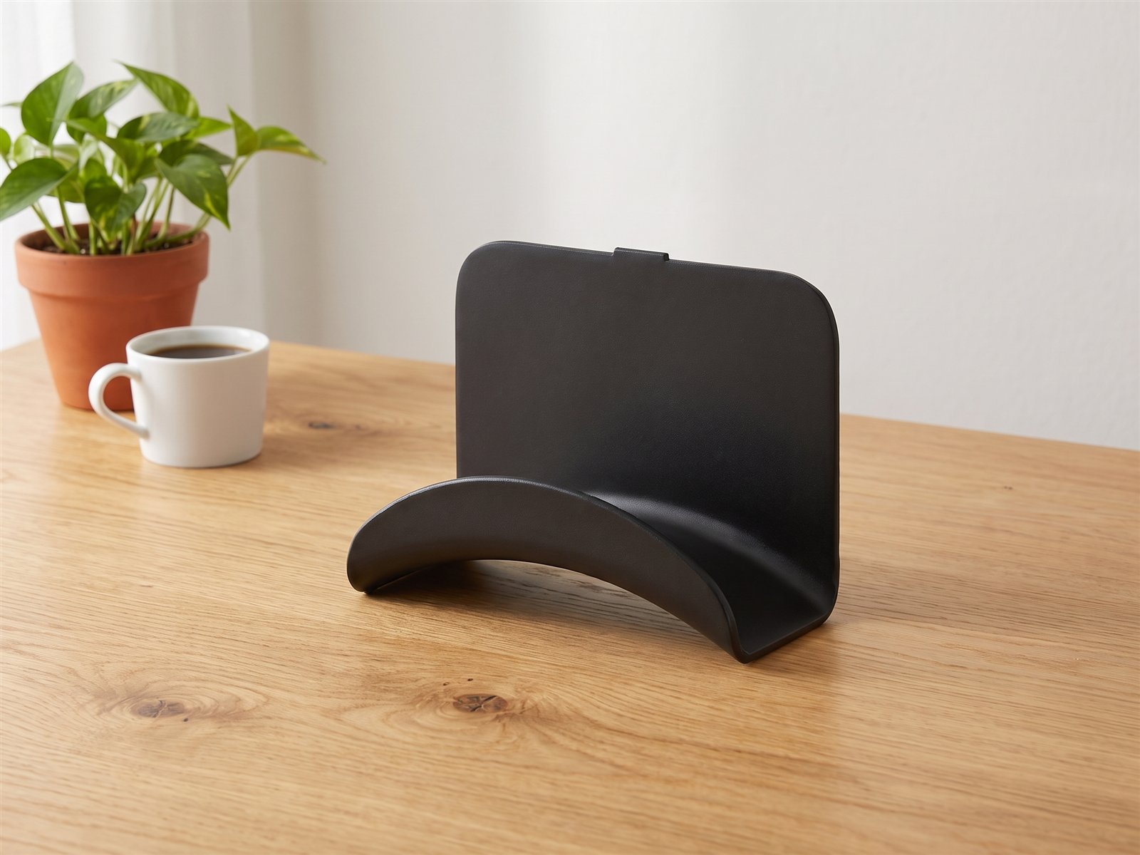 Headphone hook — Matte black · arched saddle, one smooth piece